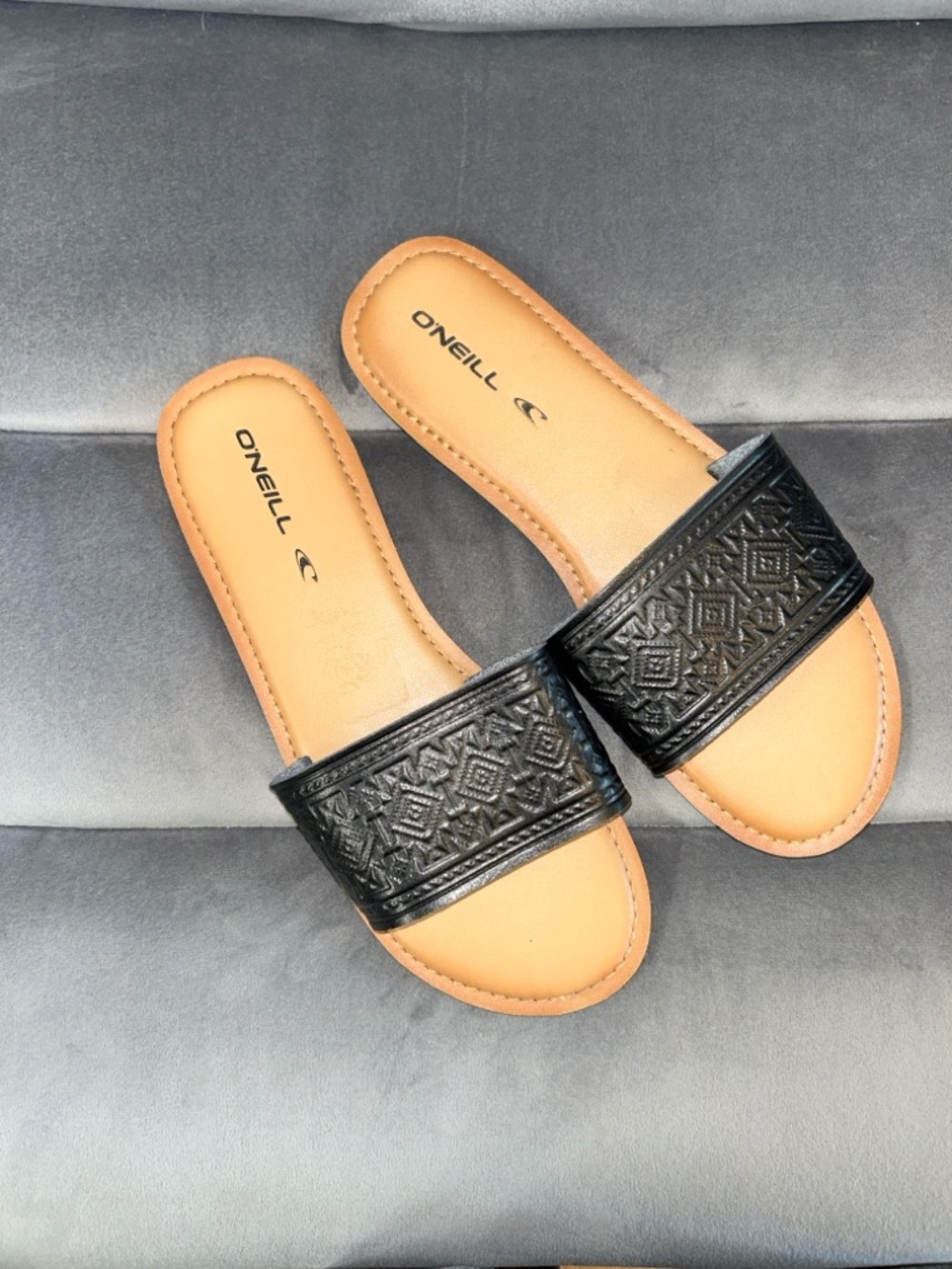 O'Neill Women's Black Embossed Slide Sandals with Tan Footbed